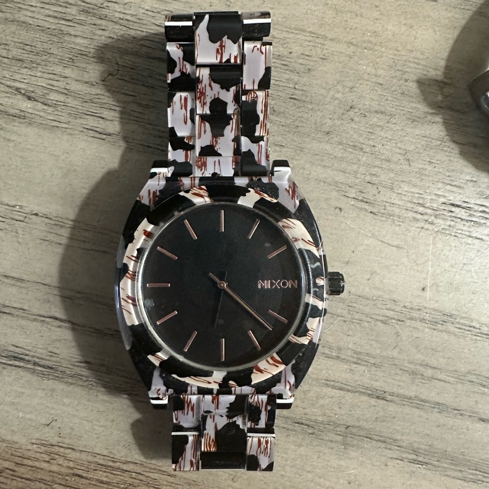 Nixon watch.